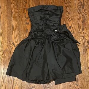 Chic Black Strapless Dress with Bow Detail